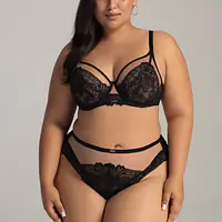 Biustonosz miękki, konstrukcja K-2103
Model AV 2146 HARMONY SOFT BRALETTE to idealne połączenie komfortu i zmysłowego designu. Czarna koronka na cielistym tiulu tworzy elegancki kontrast, który podkreśla piękno biustu. Miękkie miseczki typu bralette delikatnie otulają piersi, zapewniając wygodę i swobodę ruchów. Prześwity w górnych partiach miseczek dodają nuty tajemniczości, a seksownie podkreślony mostek wzmacnia uwodzicielski charakter modelu. Harmony zachwyca nie tylko krojem, ale także finezją ażuru, tworząc efektowną i jednocześnie wygodną bieliznę na każdą okazję.
Skład surowcowy: 88% Poliamid, 8% Bawełna, 4% Elastan.