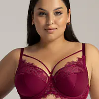 Biustonosz półusztywniony, konstrukcja K-1030
Model AV 2149 MYSTIC SEMI SOFT to kwintesencja zmysłowości w głębokim odcieniu czerwonego wina, który rozgrzewa zmysły i ciało. Półusztywniane miseczki, wspierane stabilnym obwodem, zapewniają doskonałe podtrzymanie i kształtowanie biustu, pięknie go eksponując w dekolcie. Górne partie misek oraz bawet zostały ozdobione subtelną koronką, dodającą elegancji i seksapilu. Odpinane paseczki dodatkowo podkreślają krągłość piersi, tworząc niezwykle uwodzicielski efekt. AV 2149 MYSTIC to bielizna, która obudzi Twoje zmysły i doda pewności siebie.
Skład surowcowy: 88% Poliamid, 8% Bawełna, 4% Elastan